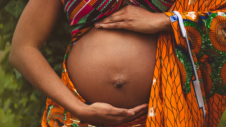 pregnant woman wearing colorful cloth