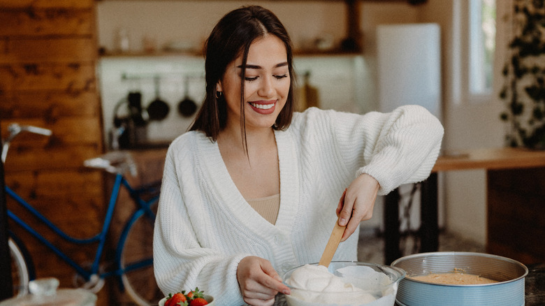 Woman cooking in her kitchen