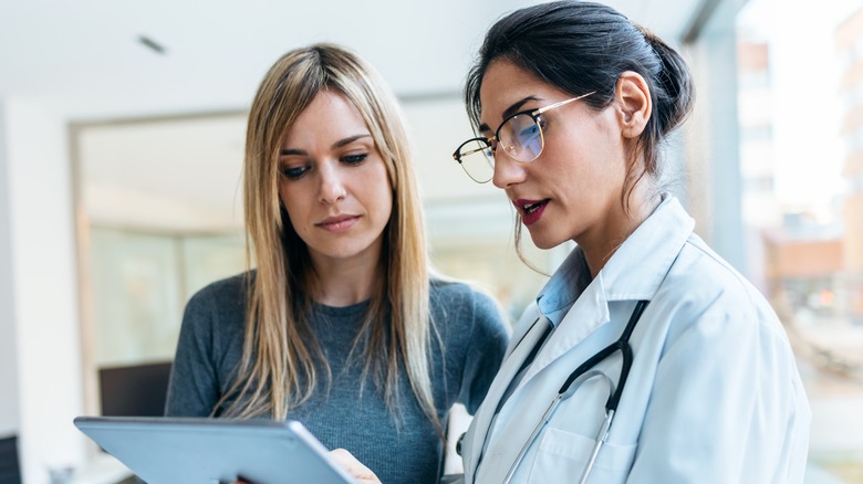 Woman talking to her doctor