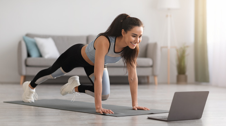 woman working out at home