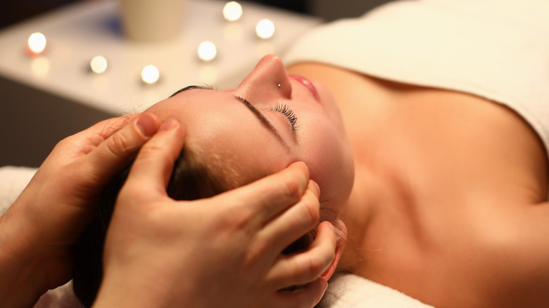 Woman getting massage at parlor