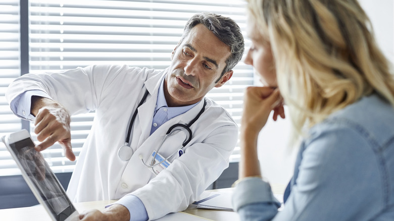 Doctor explaining test results to patient