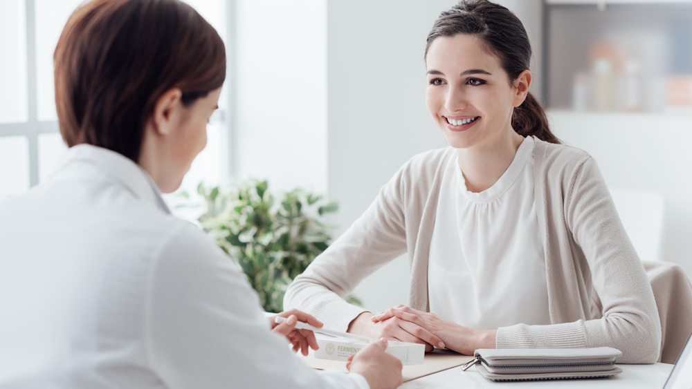 Woman talking to doctor about IUD