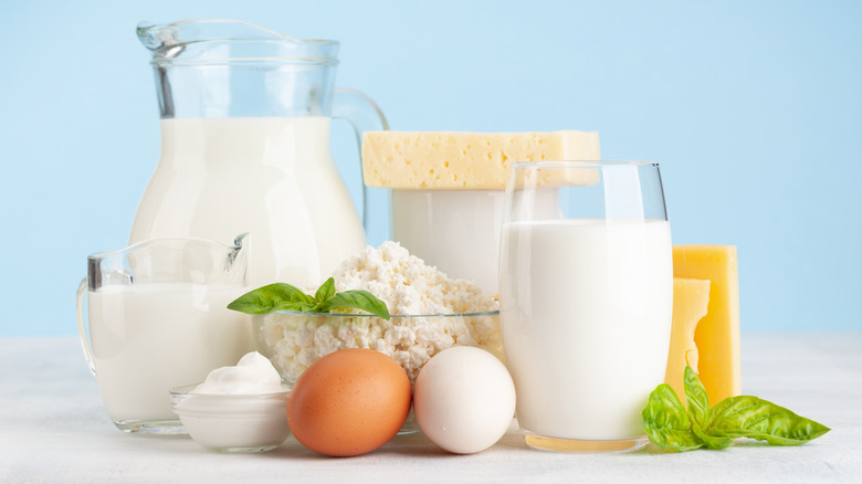 Glasses of milk and eggs on a table