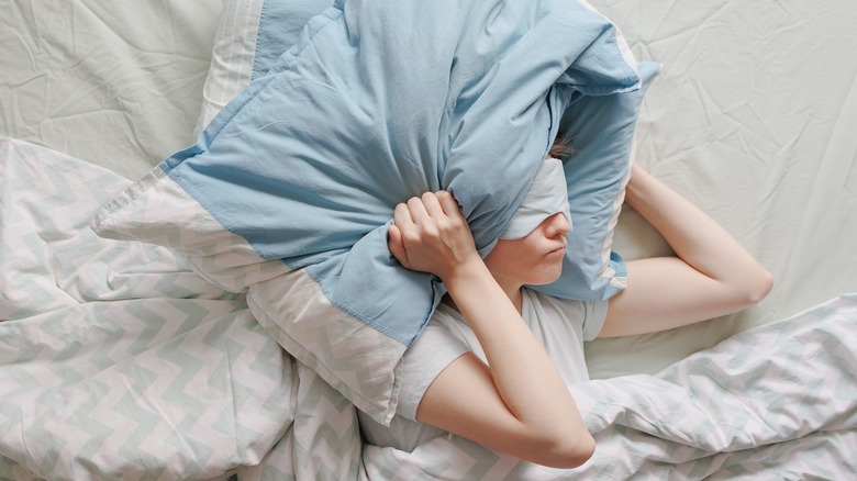 woman struggling to sleep 