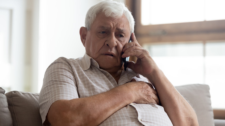 elderly man on phone