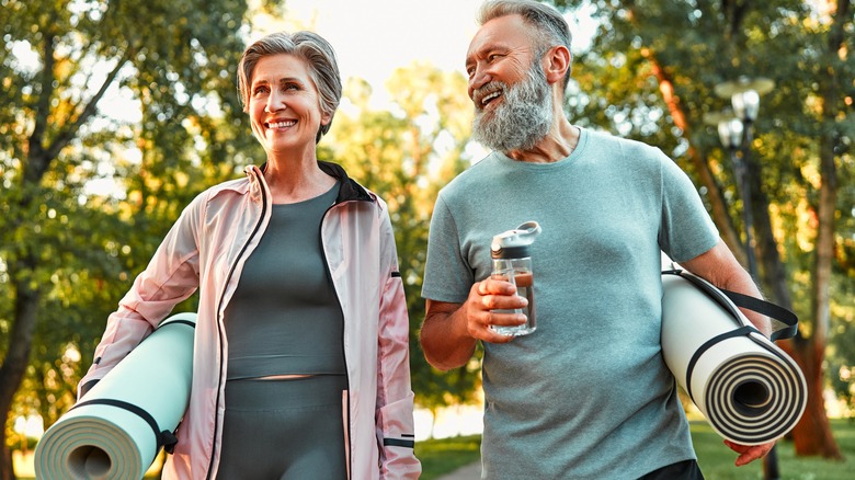 Happy senior couple going for a walk