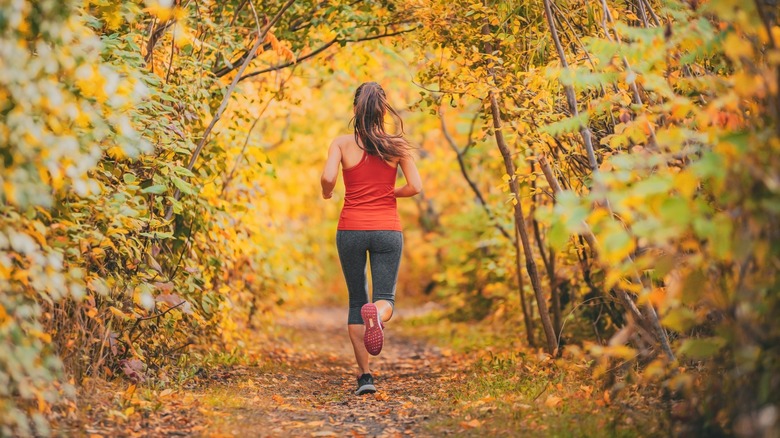 Woman running in the trails