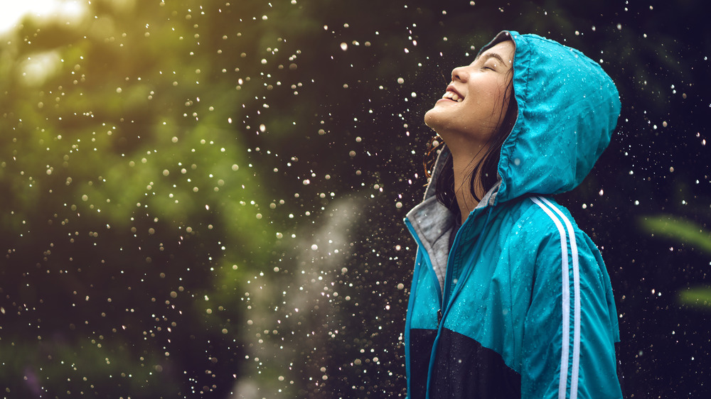 Woman smiling in the rain