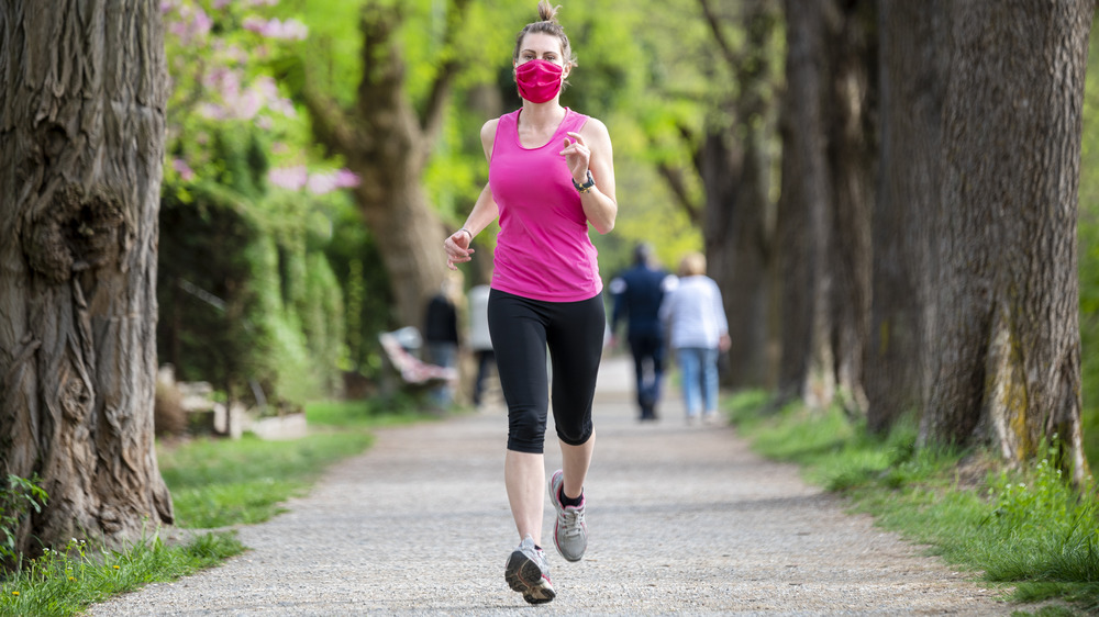 woman jogging in park