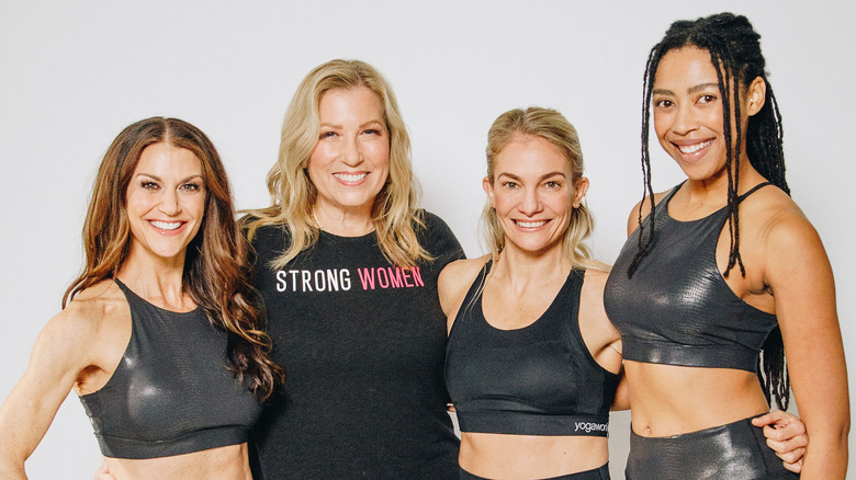 Samantha Harris and women from YogaWorks Pink smiling