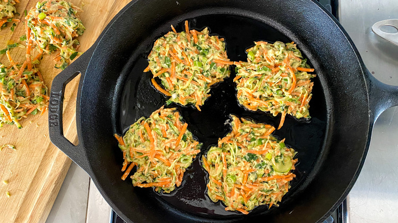 veggie pancakes cooing in pan