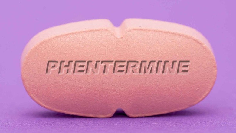 pink pill with Phentermine written on it