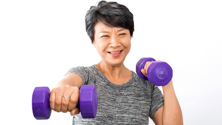 woman lifting weights