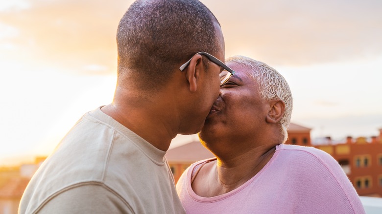 Older couple kissing