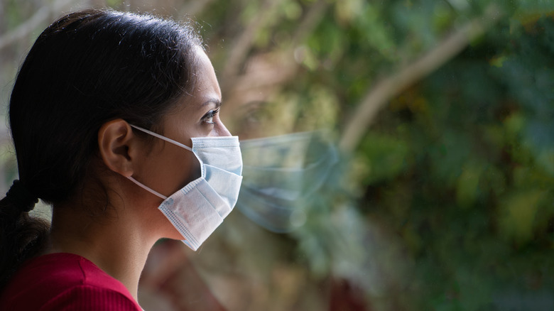 Woman wearing mask for COVID-19