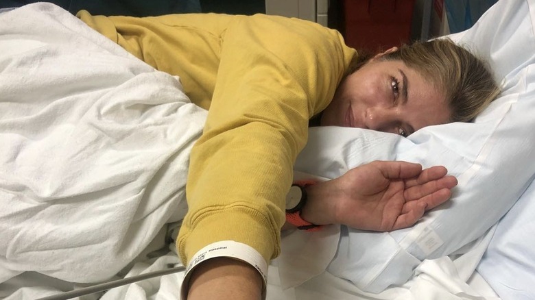 Selma Blair in a hospital bed
