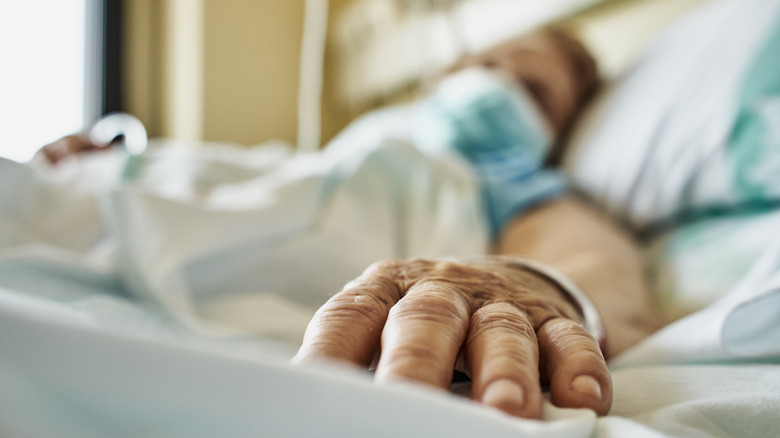 close-up of woman's hand in the ICU