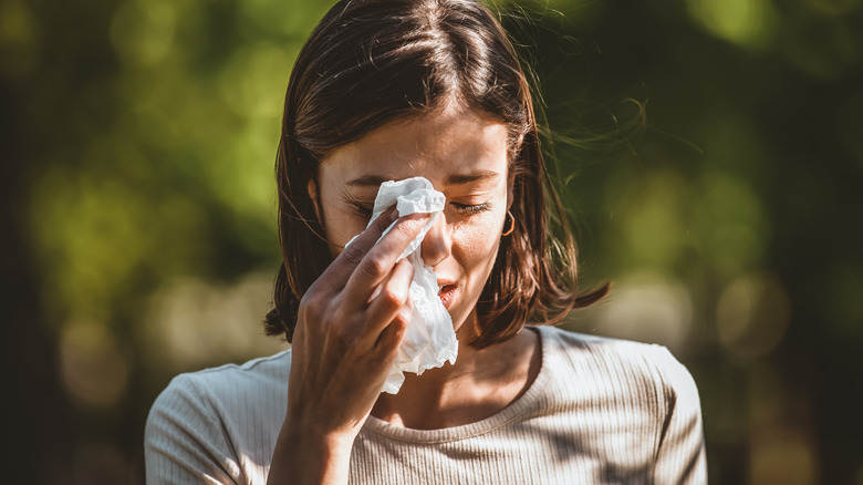 Woman having allergic reaction