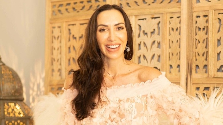 Closeup of Dr. Kate Balestrieri in an ornate room