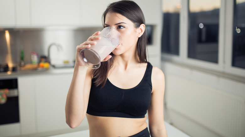 woman drinking shake