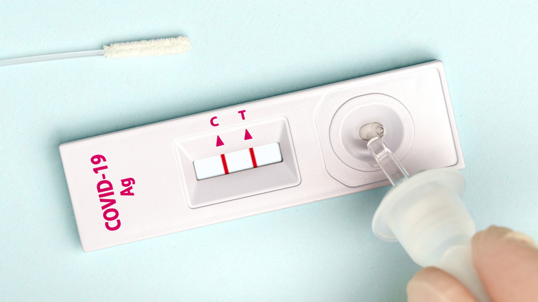 Covid-19 antigen pcr express test showing a positive result.