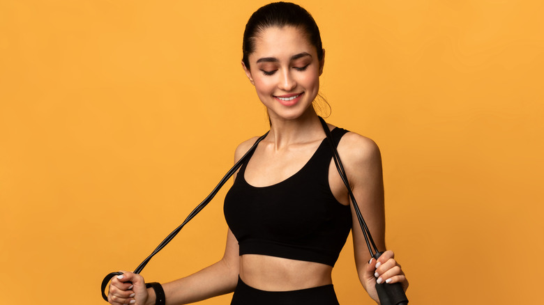 Woman holding jump rope