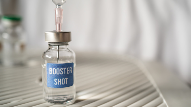 A bottle of a COVID booster shot
