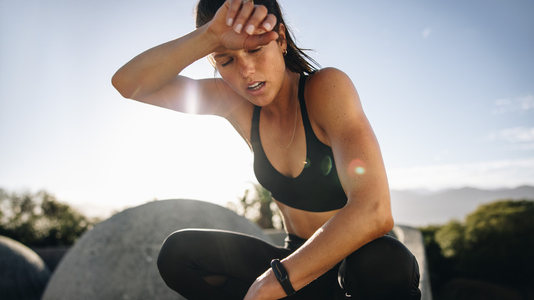 A woman feels weak and rundown while exercising 