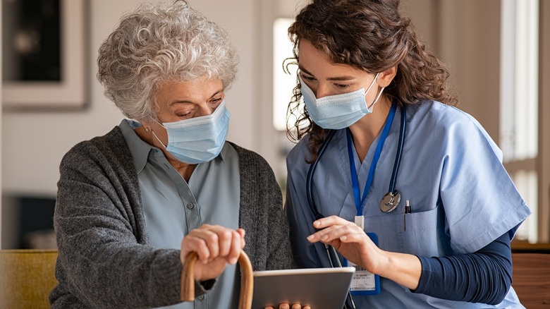 Doctor goes over patient test results 