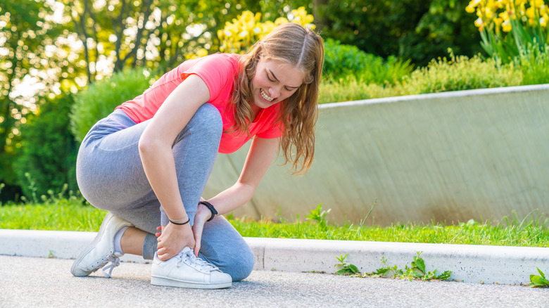 woman getting a charley horse