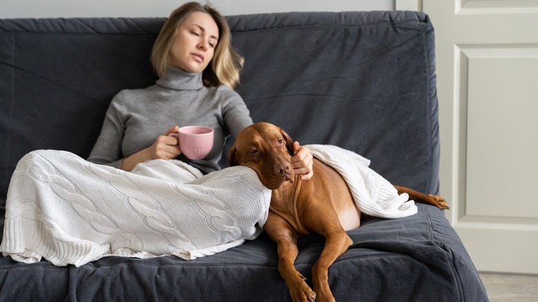 depressed woman with dog