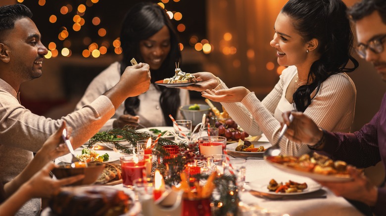 Friends celebrating with a holiday meal