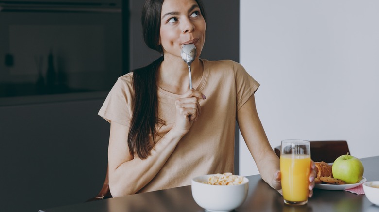 Young woman savoring a healthy breakfast