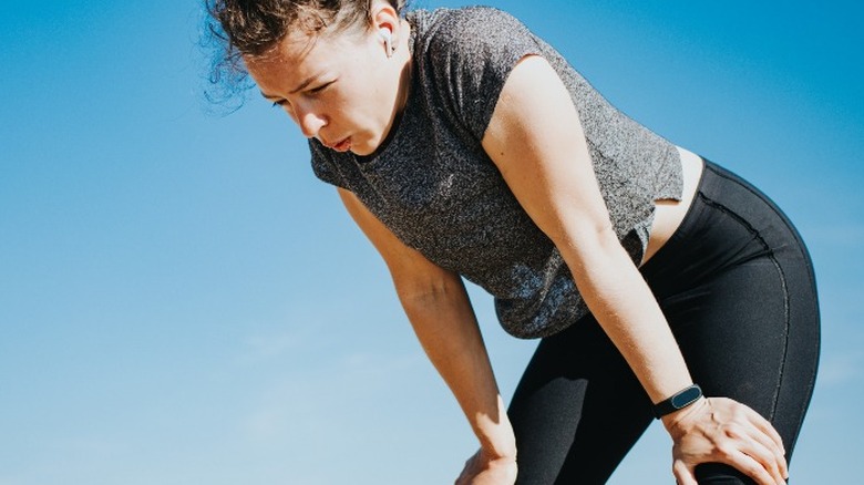 Woman breathing hard after workout