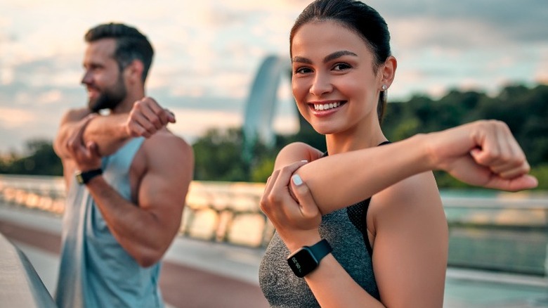 Active couple stretching together