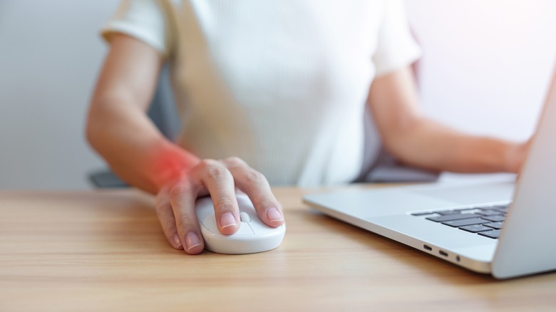 A strained wrist highlighted in red