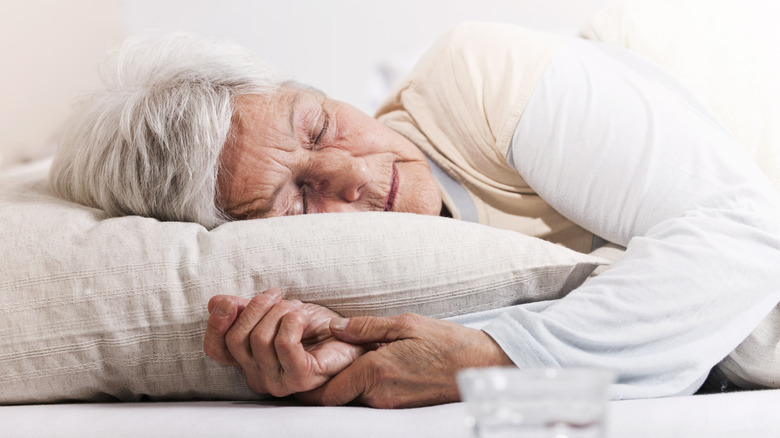 Woman sleeping in bed