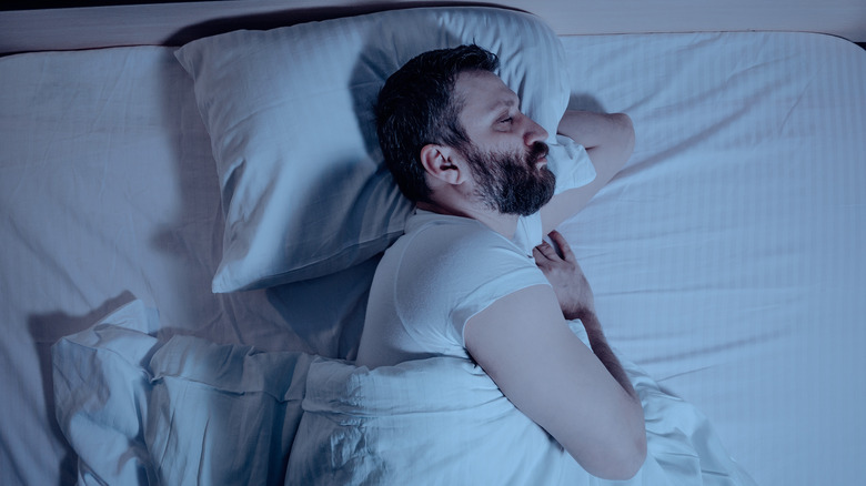 Man sleeping on left side