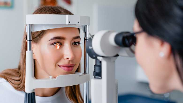 A woman visits an eye doctor