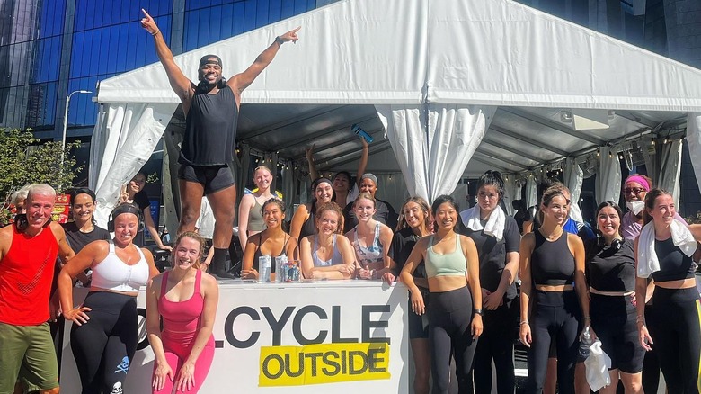Kamelle Mills and a group of SoulCycle students
