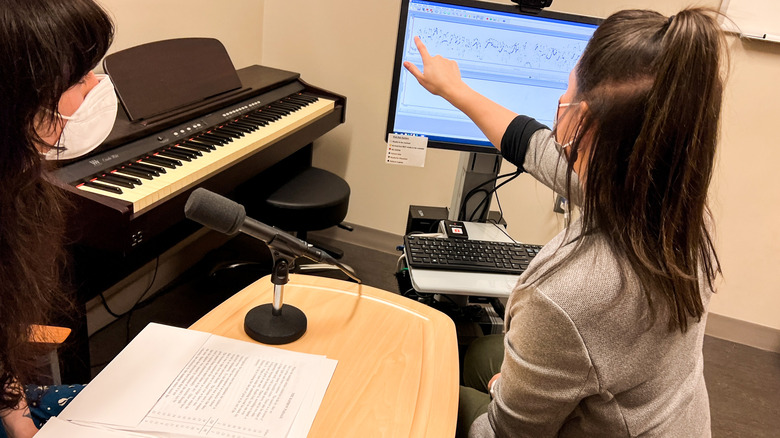 Speech pathologist Anna Lichtenstein with patient