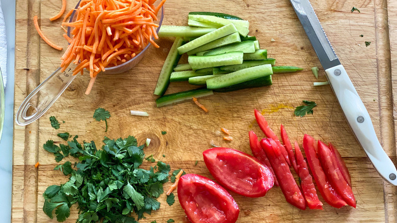 sliced veggies on cutting board