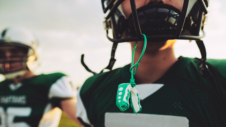 football player with mouth guard