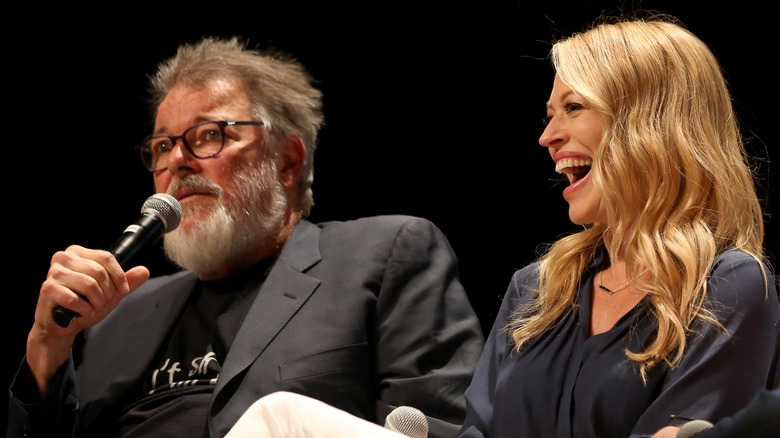 Jonathan Frakes and Jeri Ryan speaking at event