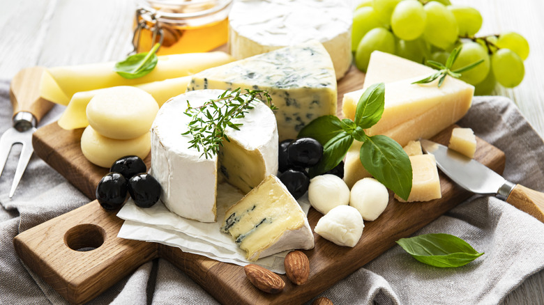 cheese board with fruits and nuts