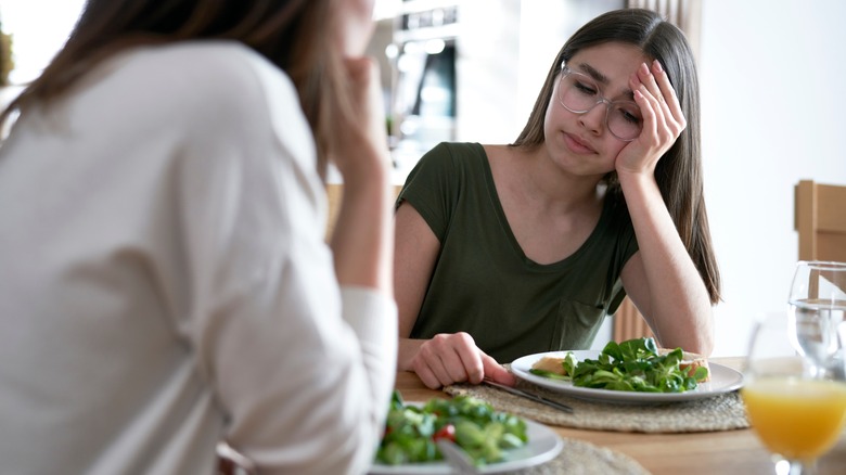 mother supports daughter with eating disorder