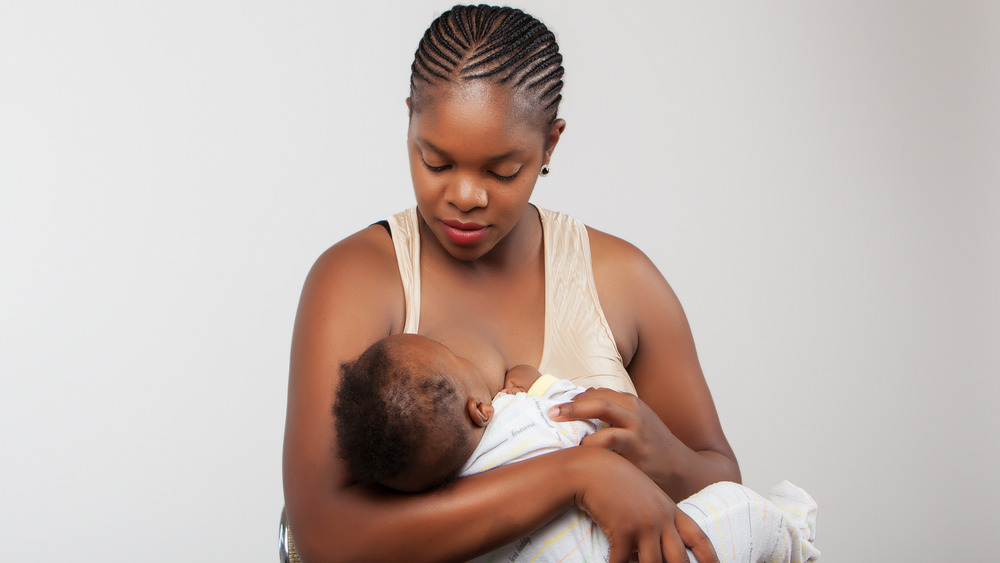 black woman breastfeeding baby
