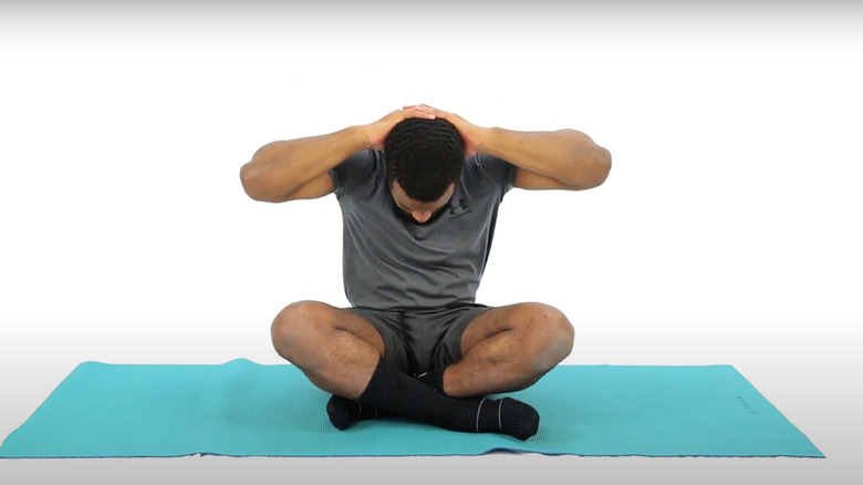 man doing neck stretch