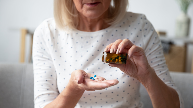 older woman with prescription medication